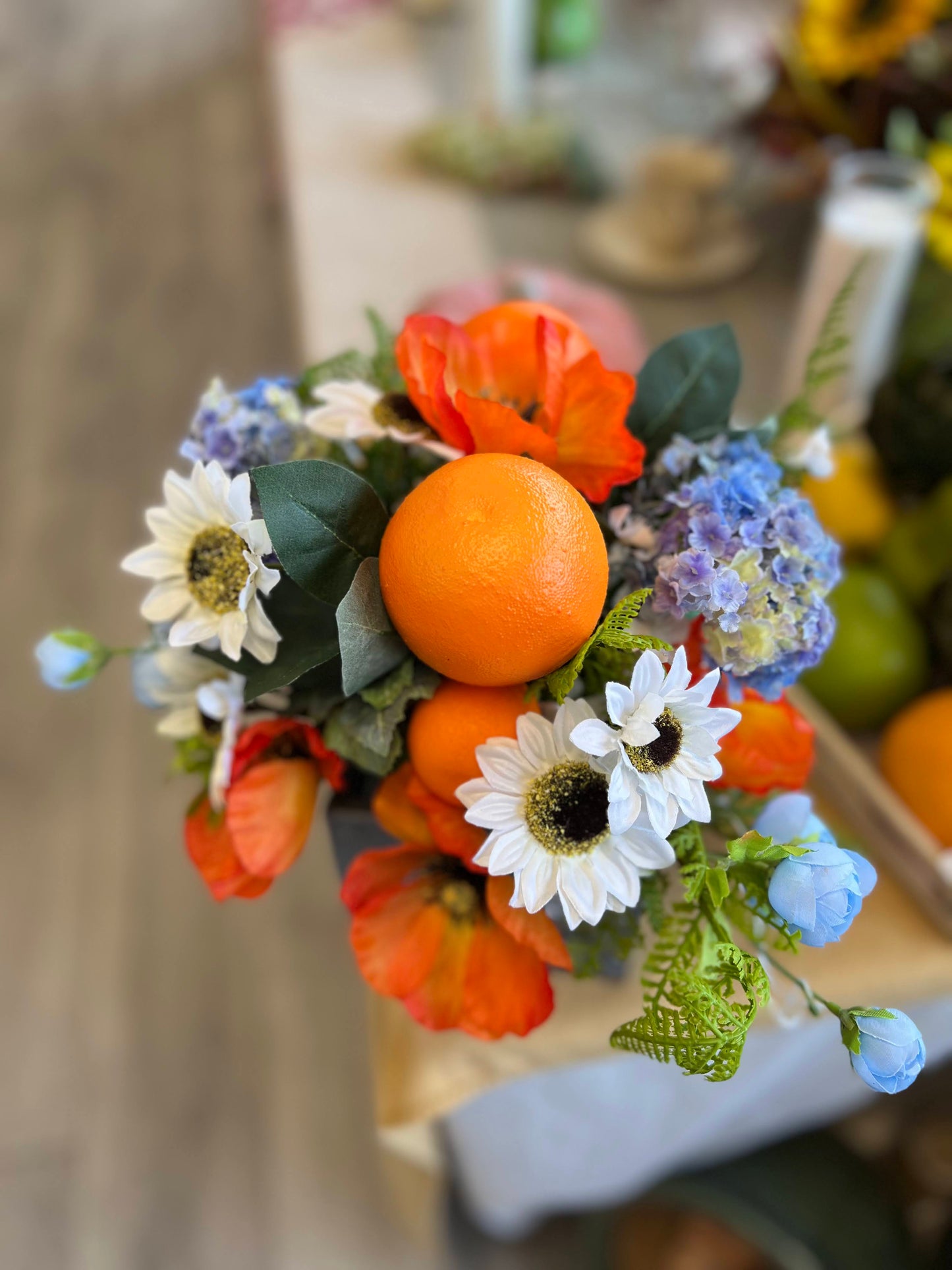 Orange, White, & Blue Flowers with Oranges