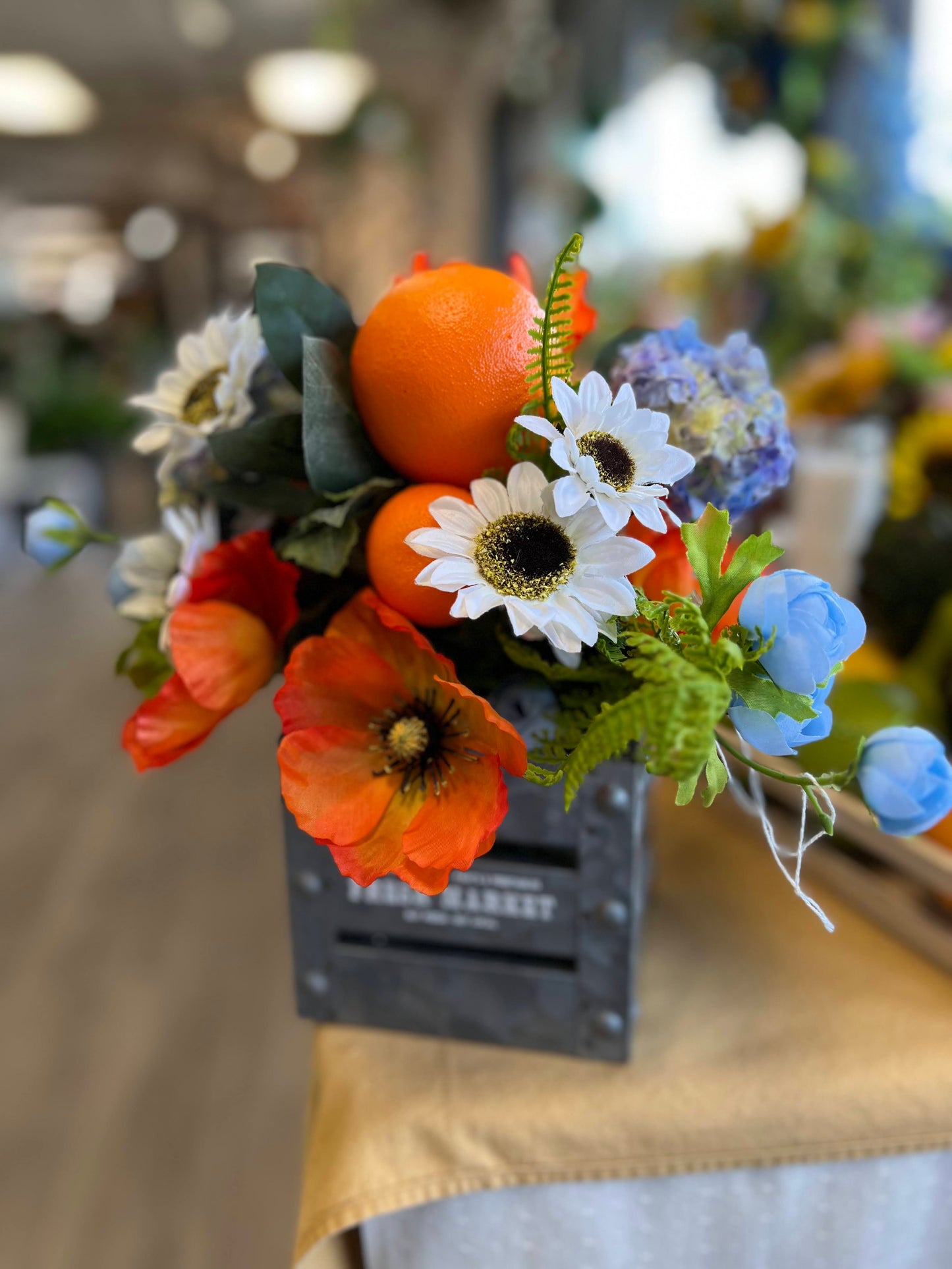 Orange, White, & Blue Flowers with Oranges